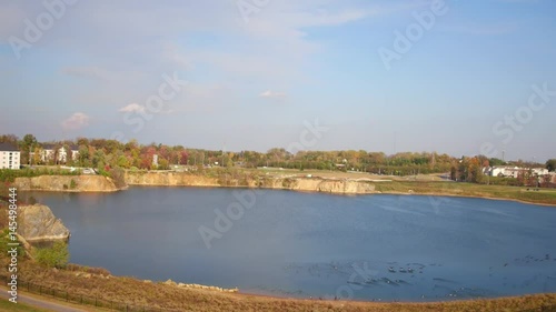 Birds landing on water in a quarry