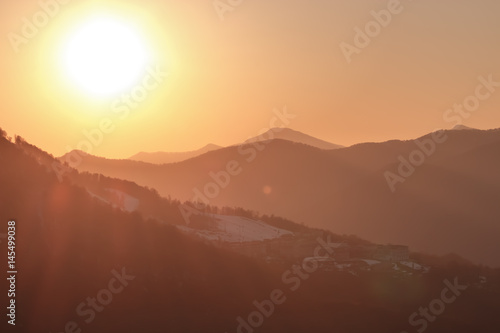 Golden rays of the sun at sunset in the mountains © OLGA