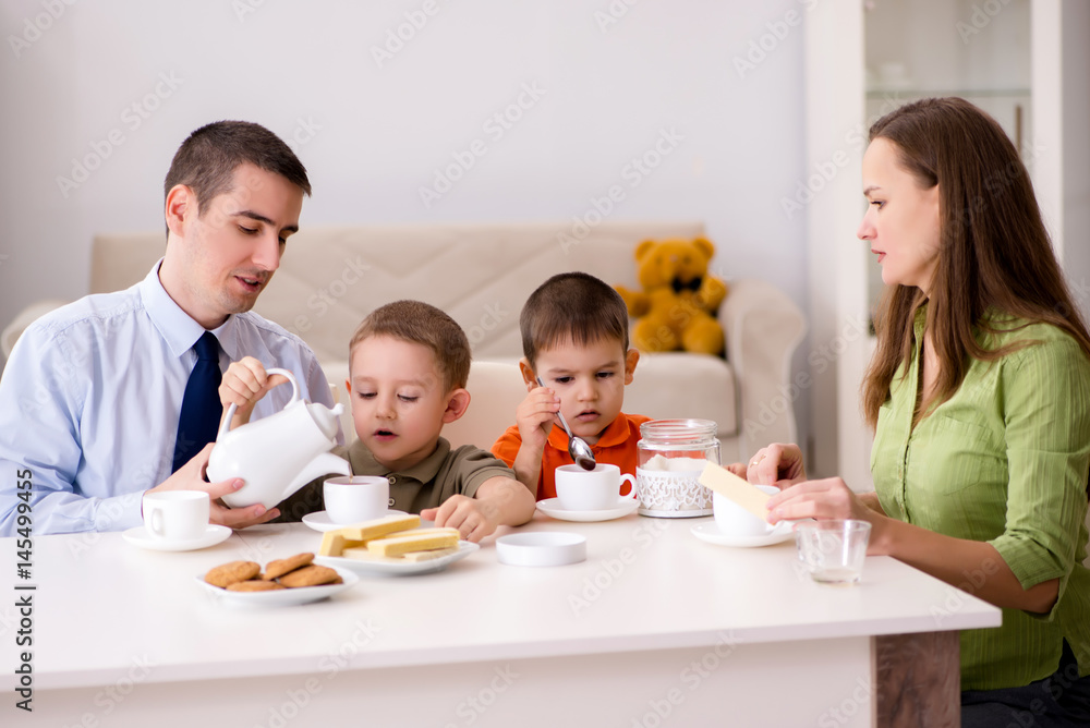 Happy family having breakfast together at home Happy family having breakfast together at home