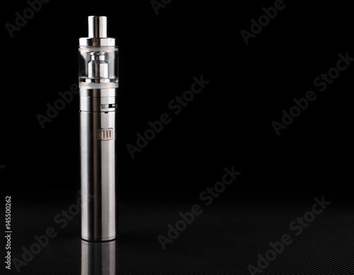 electronic cigarette or vaping device on black background