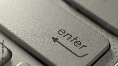 Computer keyboard enter key macro shot with different ways of pressing the key from a tap to an angry and frustrated multiple pressing.