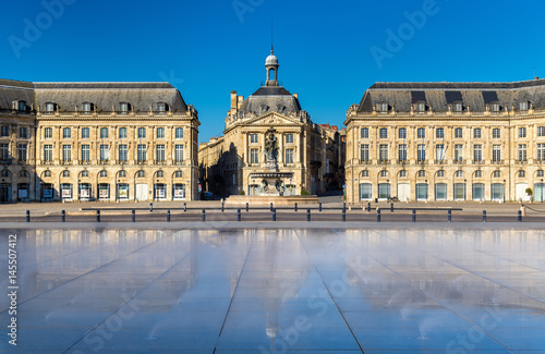 Famous water mirror fountain in front of Place de la Bourse in Bordeaux, France