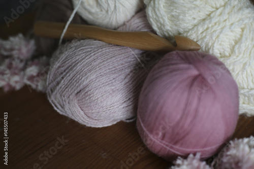 White and Pink Yarn with Wooden Knitting Crochet Needle