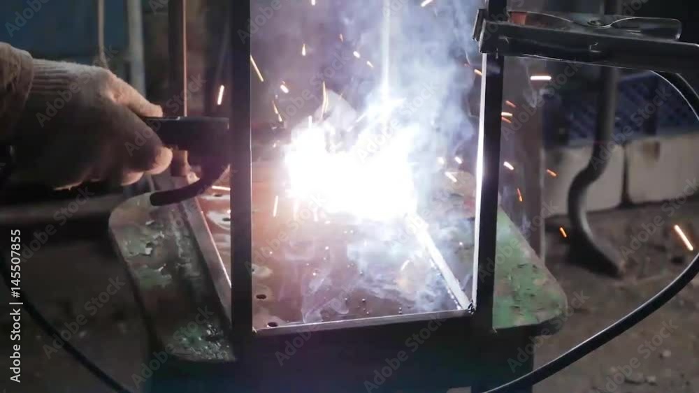 Welder cooks metal Welder cooks metal