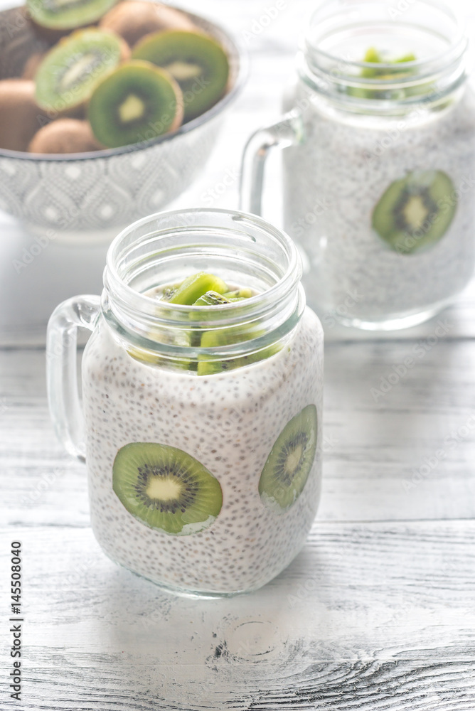 Chia seed puddings with kiwifruit slices Chia seed puddings with kiwifruit slices