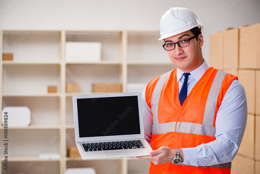 Man working in postal parcel delivery service office Man working in postal parcel delivery service office
