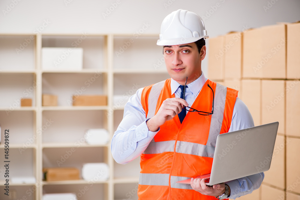 Man working in postal parcel delivery service office Man working in postal parcel delivery service office