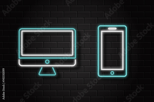 Vector isolated computer and phone neon sign on the wall background. Concept of electronics market and computer shop.