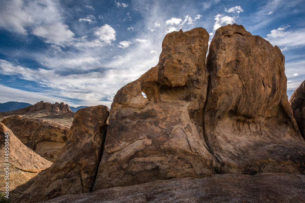 Amazing giant rock formations with blue sky and clouds at Alabama Hills, Lone Pine, California