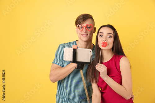 Happy young couple taking s...