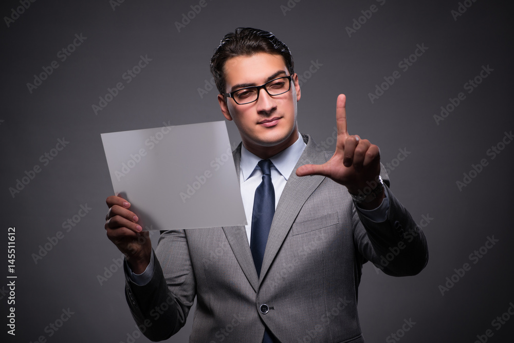 Handsome businessman working on tablet computer Handsome businessman working on tablet computer