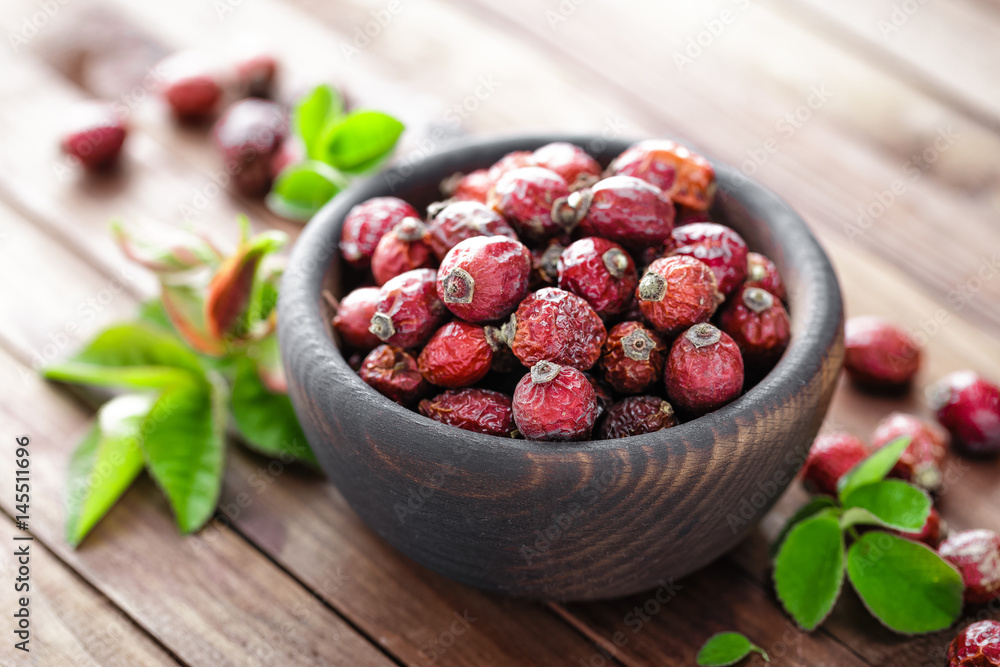 Dog rose or rosehip berries with leaves, dried briar Dog rose or rosehip berries with leaves, dried briar