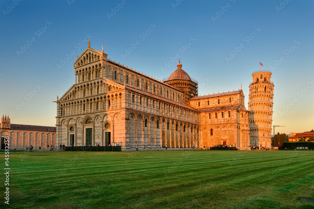 Sunset view of Pisa Cathedral (Duomo di Pisa) with the Leaning Tower of Pisa (Torre di Pisa) on Piazza dei Miracoli in Pisa, Tuscany, Italy