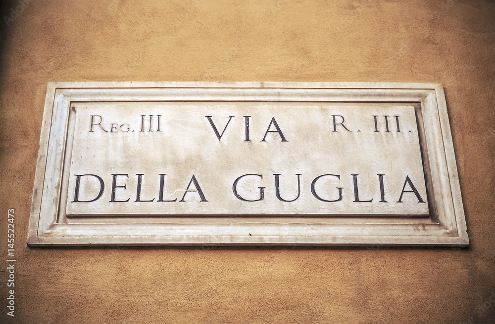 Old street sign in Rome, Italy - Via della Guglia. Old street sign in Rome, Italy - Via della Guglia.