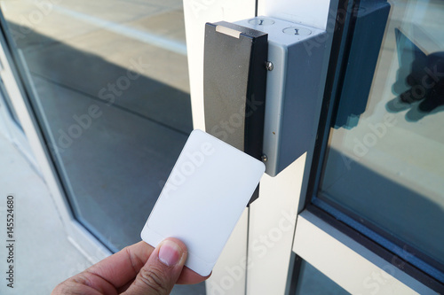 Принти на полотні using white entrance card at door entrance card reader
