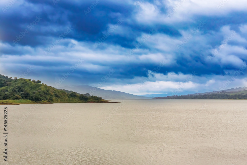 Arenal lagoon lake at the footsteps of Volcano Arenal in Costa Rica Arenal lagoon lake at the footsteps of Volcano Arenal in Costa Rica