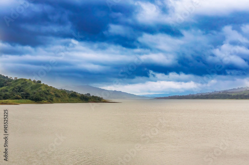 Fototapeta Naklejka Na Ścianę i Meble -  Arenal lagoon lake at the footsteps of Volcano Arenal in Costa Rica
