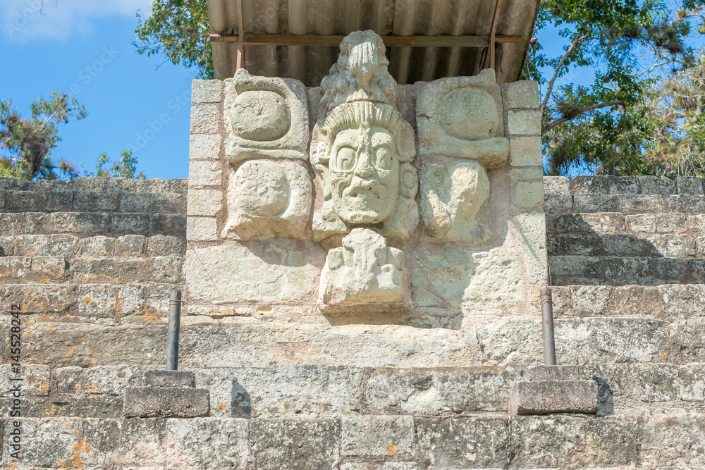 Carved stones at the  Mayan ruins in Copan Ruinas, Honduras