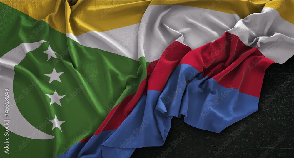 Obraz premium Comoros Flag Wrinkled On Dark Background 3D Render