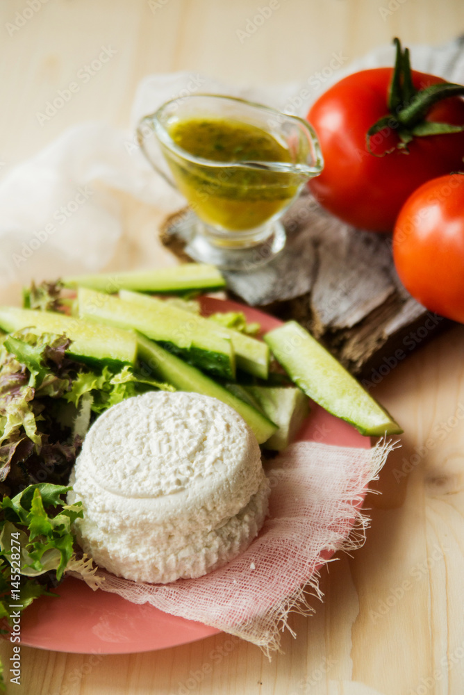 Greek Salad with Tomatoes, Cubed Feta Cheese, Olives, Cucumber and other Vegetables Greek Salad with Tomatoes, Cubed Feta Cheese, Olives, Cucumber and other Vegetables