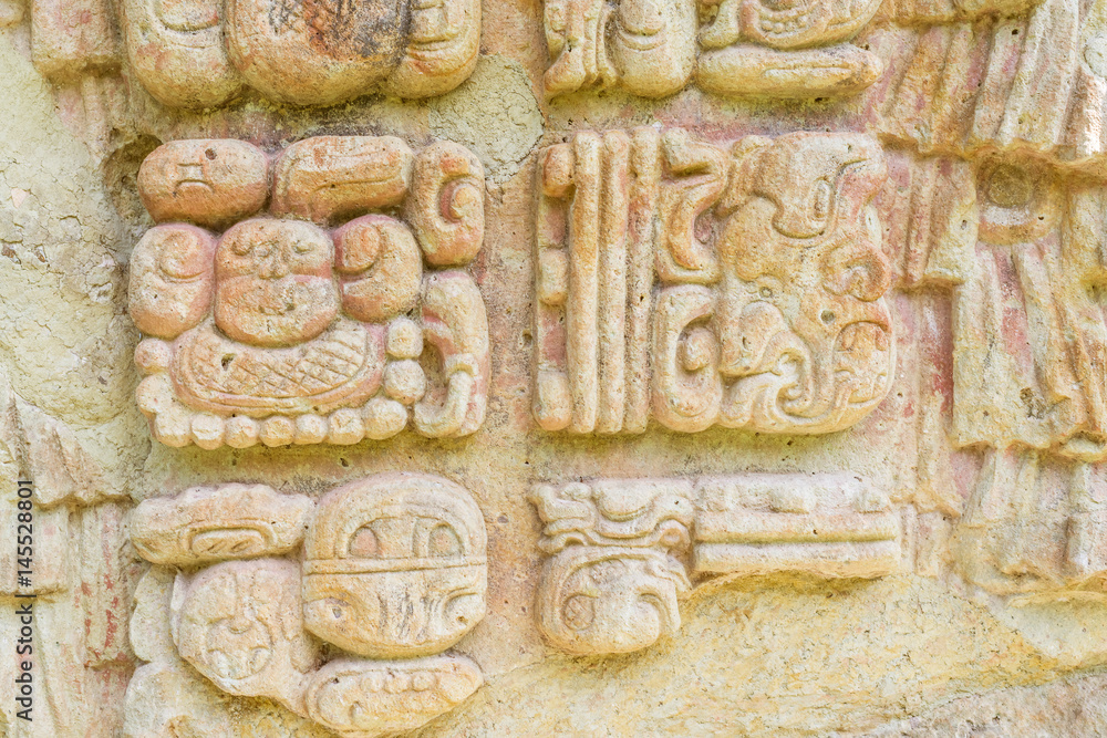 Carved stones at the  Mayan ruins in Copan Ruinas, Honduras