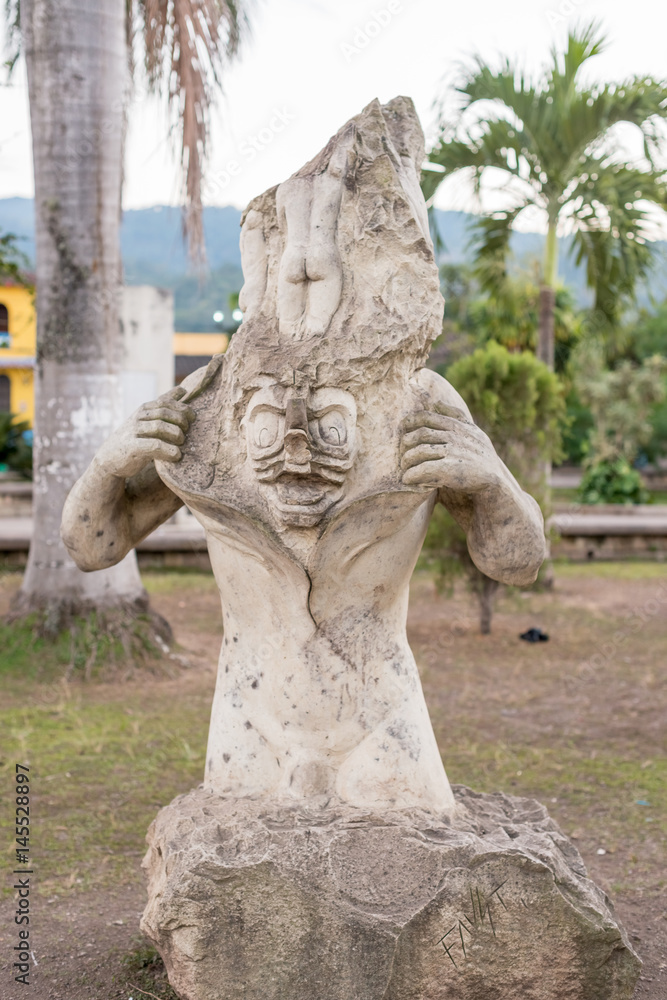 Stone carved at the central park in Copan Ruinas, Honduras.