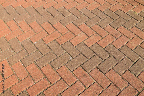Sidewalk textured background. Detail of a pavement