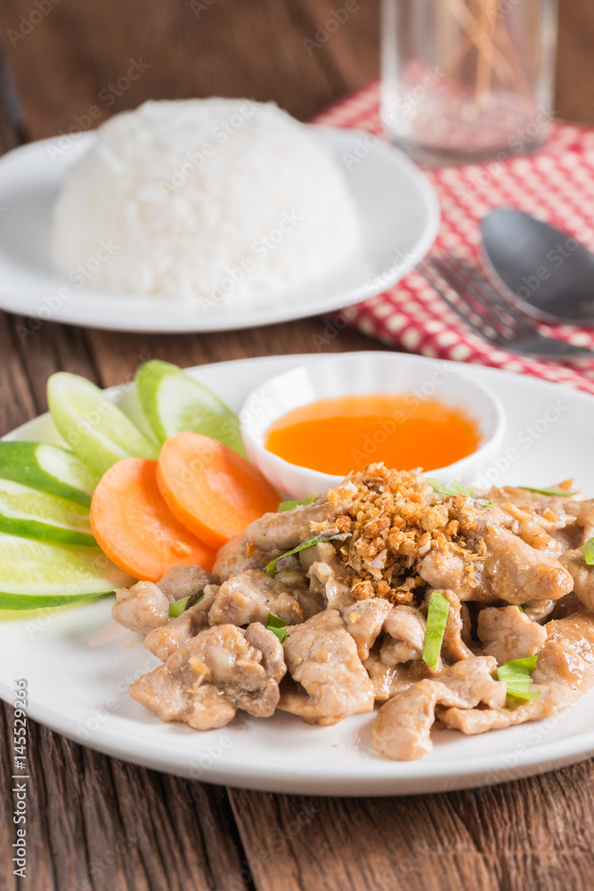 Fried pork with garlic and rice. Fried pork with garlic and rice.