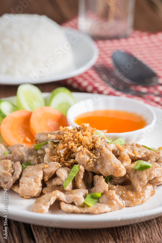 Close up, Fried pork with garlic and rice.