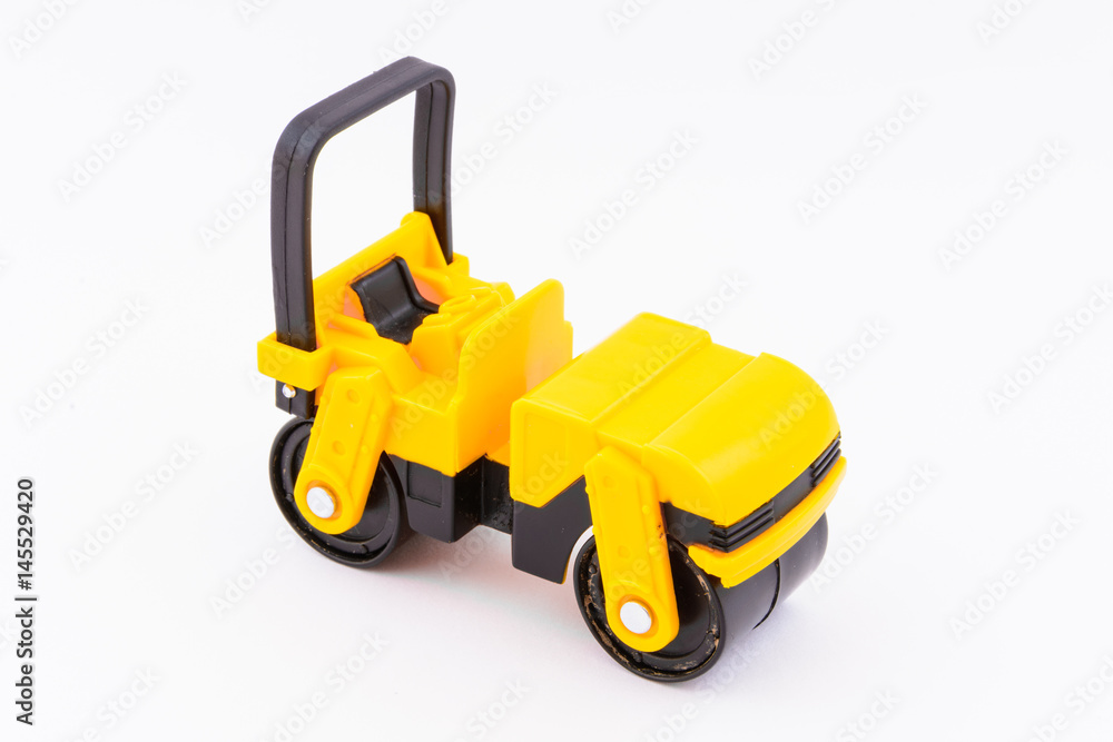 Isolated model of yellow steamroller on white background Isolated model of yellow steamroller on white background