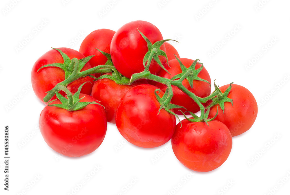 Pile of the ripe red tomatoes on the branches