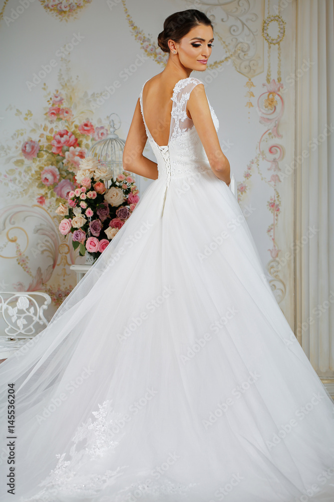 Model posing in a beautiful wedding dress Model posing in a beautiful wedding dress