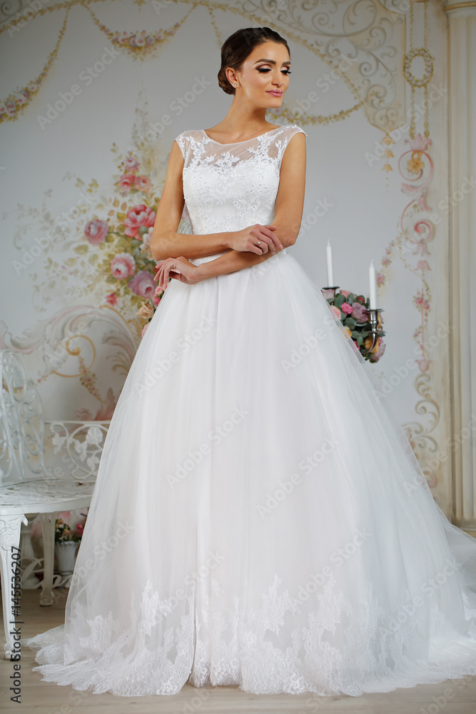 Model posing in a beautiful wedding dress Model posing in a beautiful wedding dress