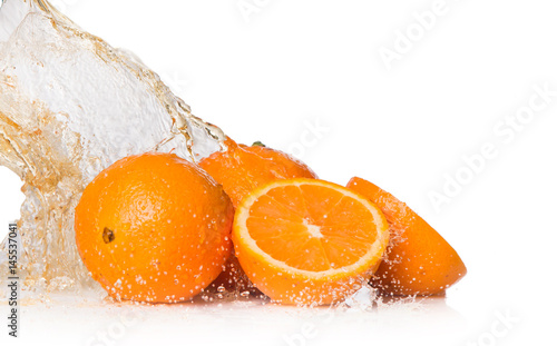 Fototapeta Naklejka Na Ścianę i Meble -  Water splash with orange and lime isolated on white background. Splash motion with fruits. Abstract object 