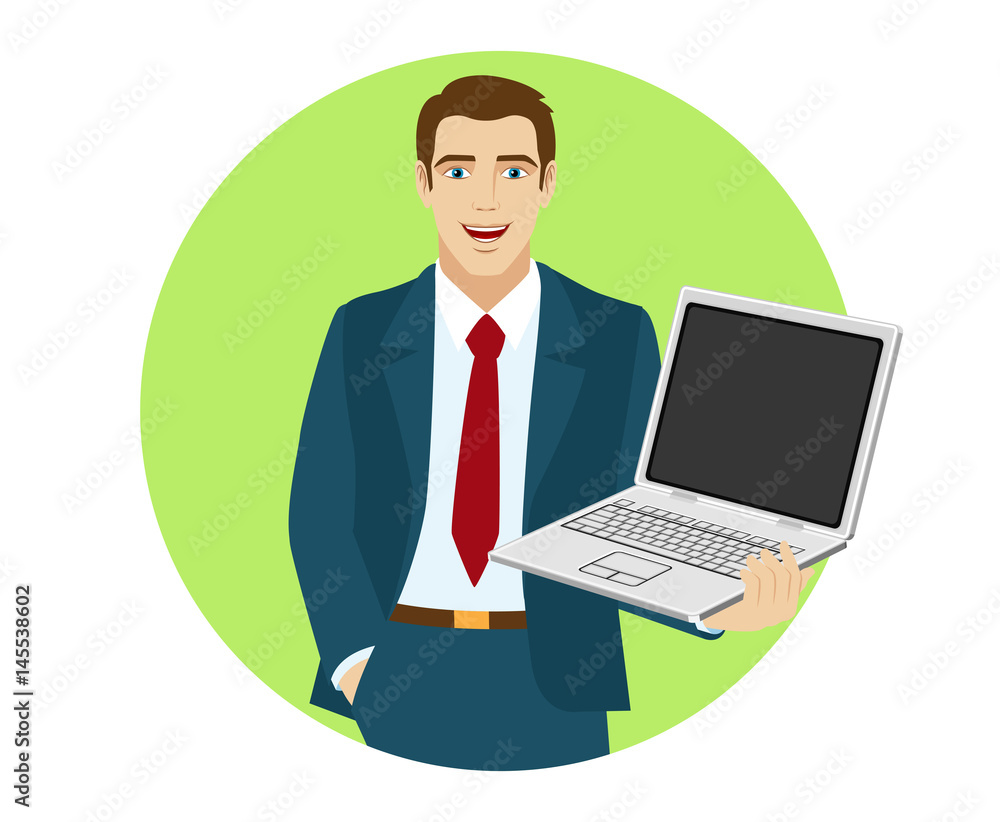 Businessman holding laptop notebook