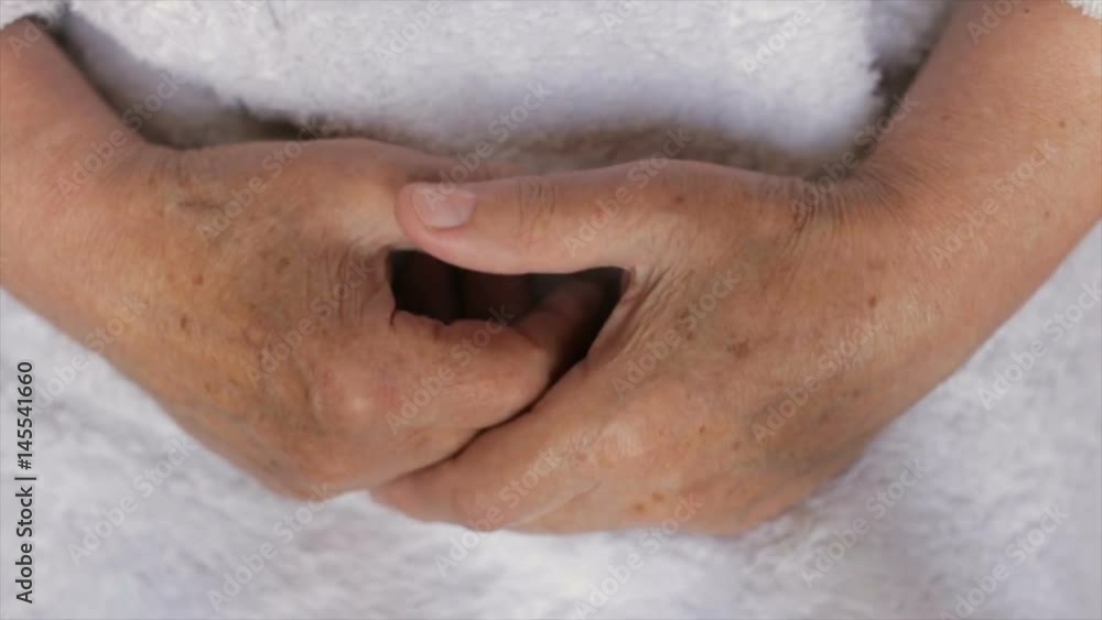 Wrinkled female hands, close-up Wrinkled female hands, close-up