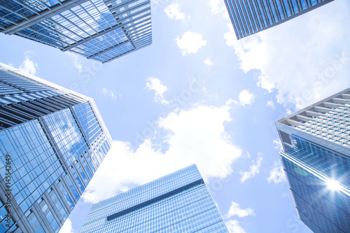 Business buildings against blue sky