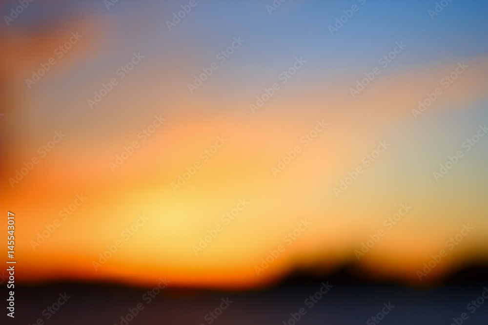 Blurred sunset on the lake