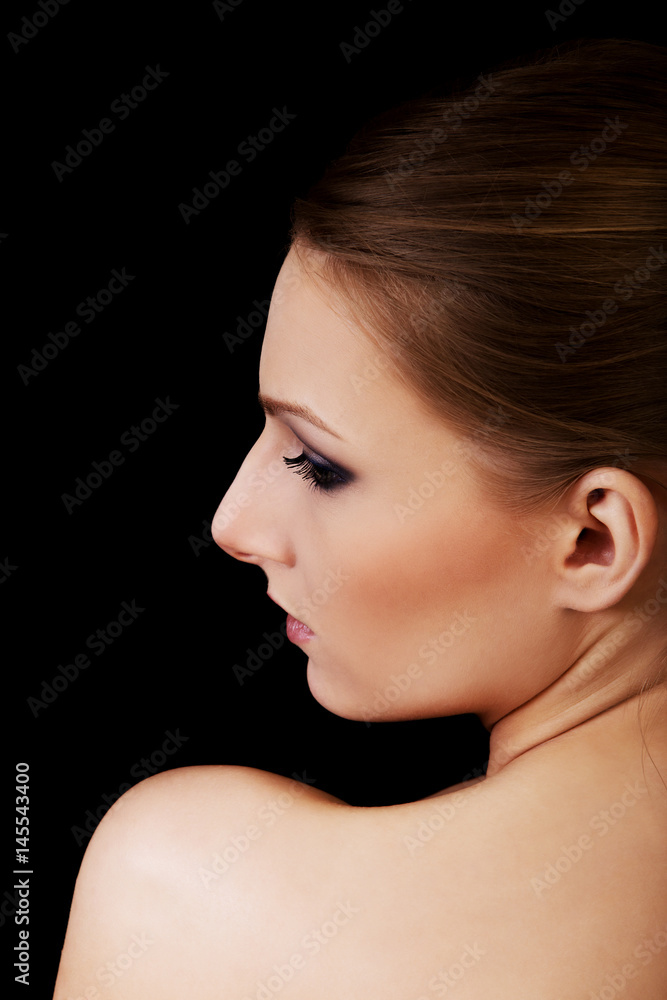 Attractive blonde topless woman with dark make up Attractive blonde topless woman with dark make up