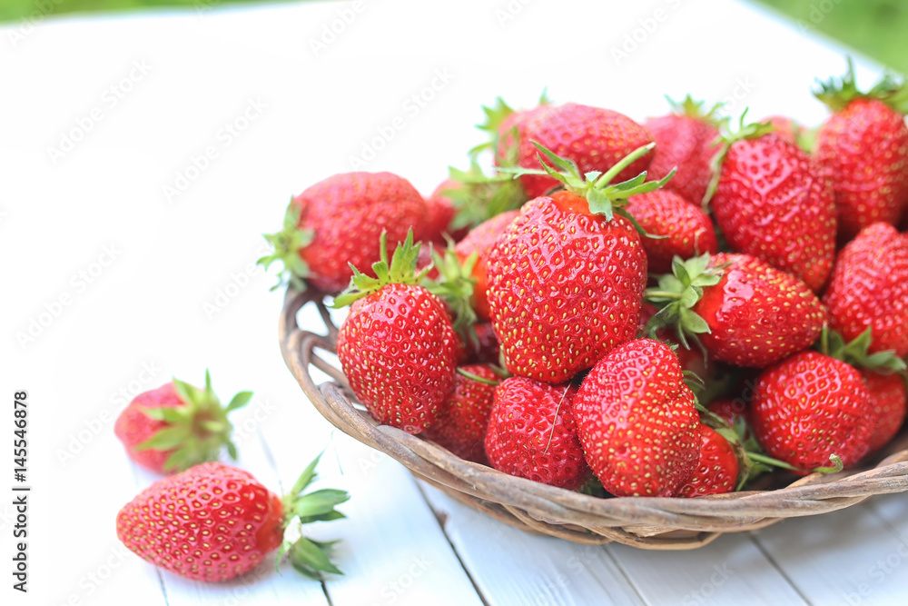 Strawberry on rustic wooden background Strawberry on rustic wooden background