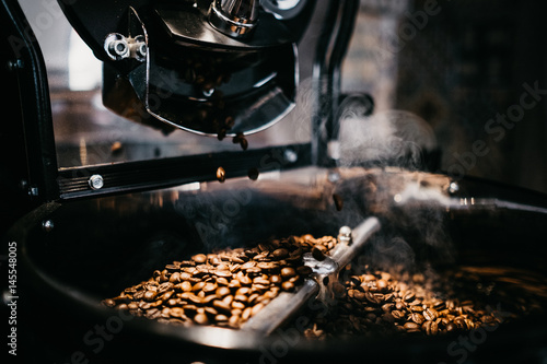 Close-up coffee grinding machine photo