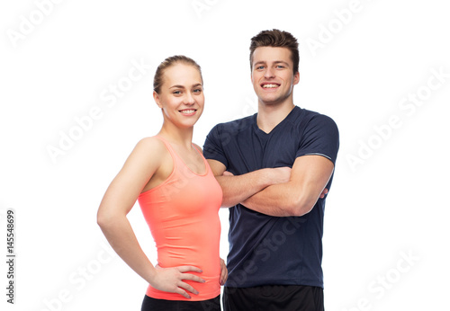 happy sportive man and woman