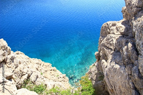 Clear blue sea and rocky coast near Karlobag, touristic place in Croatia