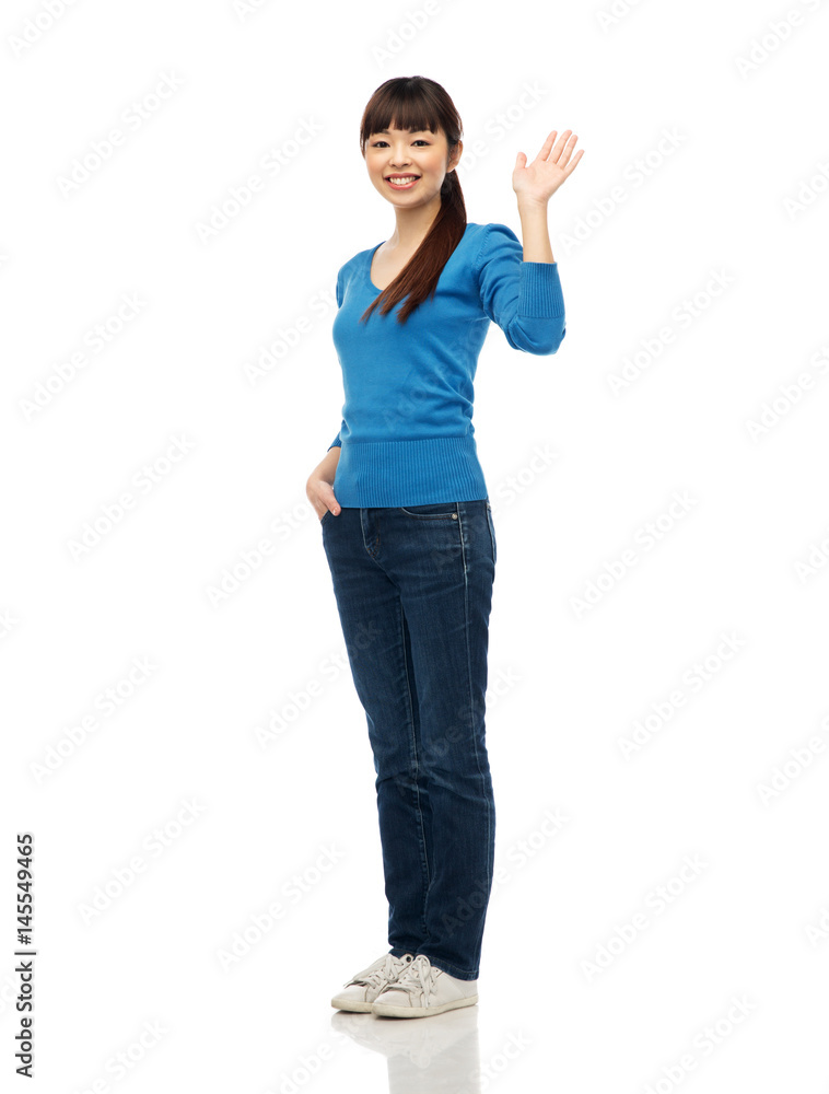 happy smiling young woman waving hand over white happy smiling young woman waving hand over white