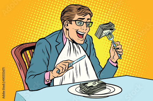 Businessman eating money