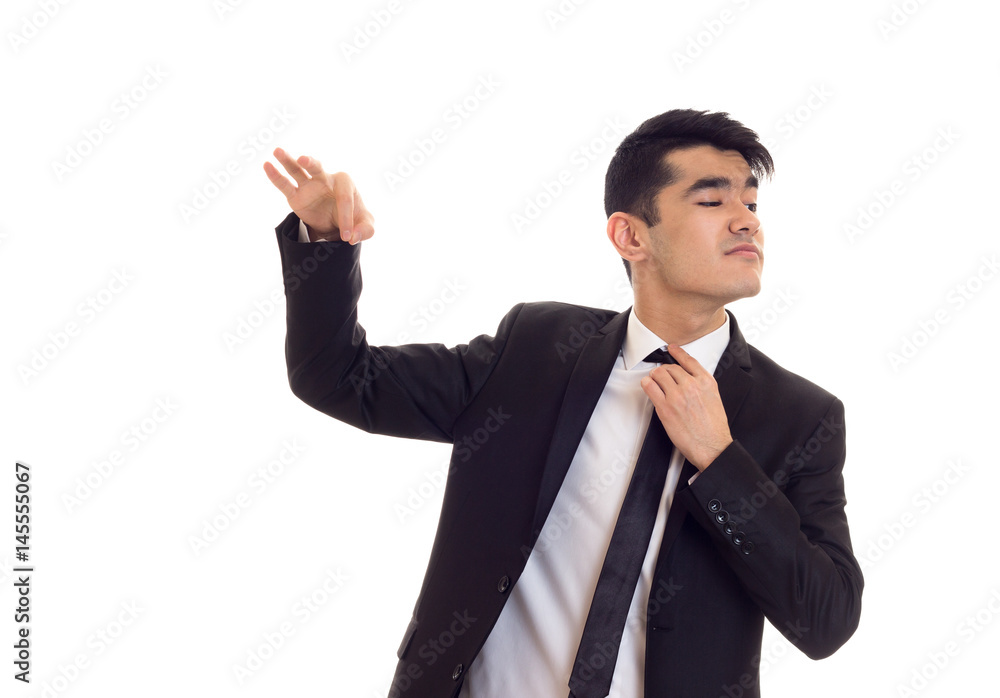 Young man in black tuxedo Young man in black tuxedo