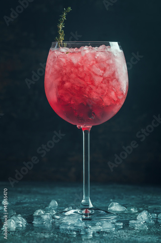 Red drink with ice
