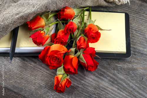 red roses on wooden board, Valentines Day background photo