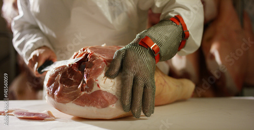 slow motion salting of parma ham professional and traditional of the history and culture of genuine and healthy food