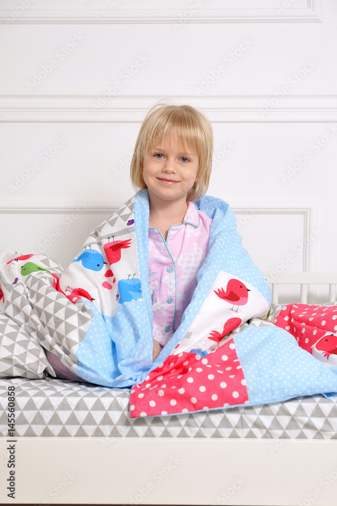 Beautiful baby girl sleeping in her bed and waking up Beautiful baby girl sleeping in her bed and waking up